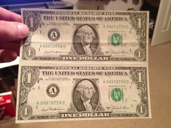 Two-$1-Bills-Uncut!